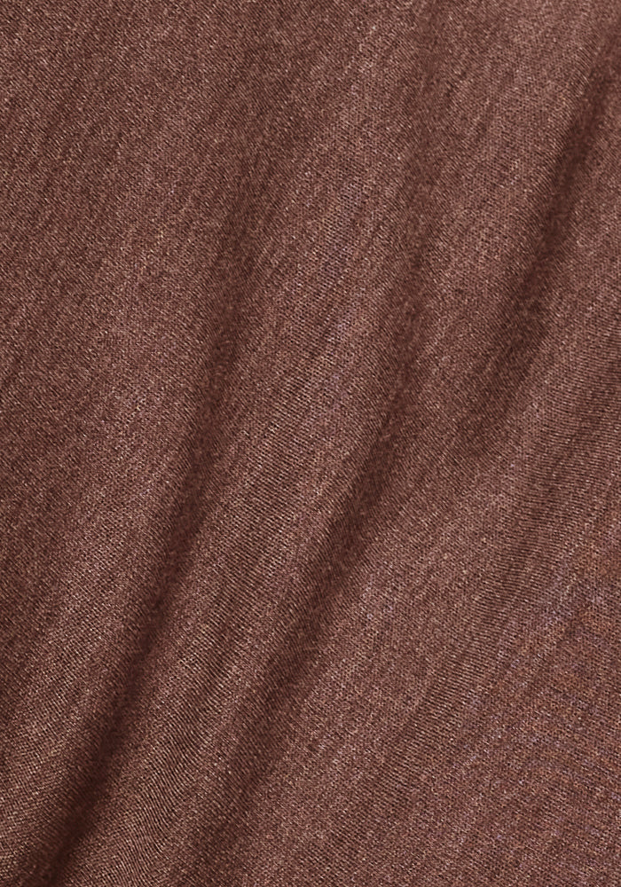 Close-up of Woolx Hannah Long Sleeve Top in Sable Heather, showing its textured Merino wool fabric and soft folds.