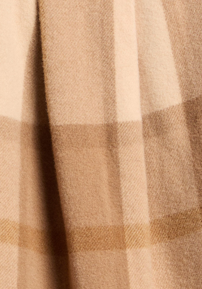 Close-up of Woolx Sawyer Shacket - Saddleback Plaid, featuring soft merino wool with tan and beige plaid folds.