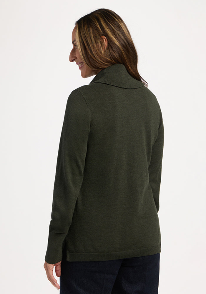 Woman wears the Woolx Josie Cowl Neck Sweater in Duffel Bag, facing away and glancing over her shoulder.
