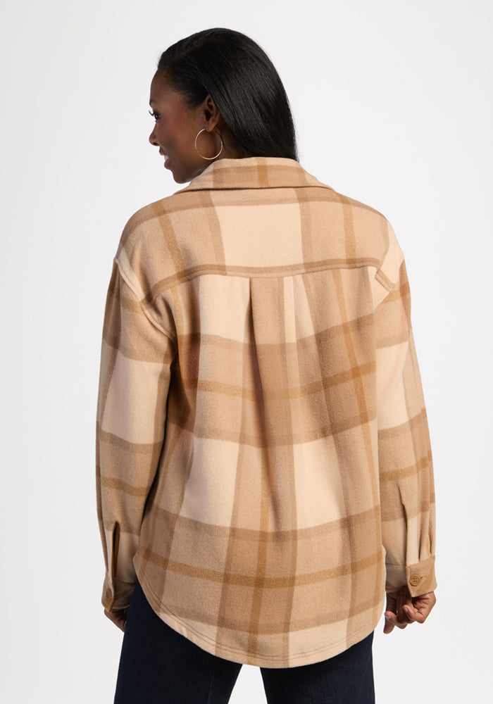 Woman in Woolx Sawyer Shacket - Saddleback Plaid, back to camera, set against a plain white background.