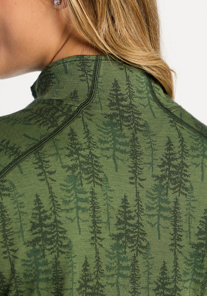 Woolx Emi 1/4 Zip - Forest Friends worn by light brown-haired person, seen from behind.