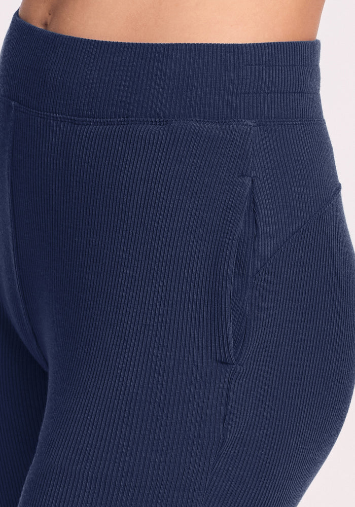 Close-up of Woolx Luca Petite Pants - Ocean Cavern with ribbing, wide waistband, side pocket & navy finish.