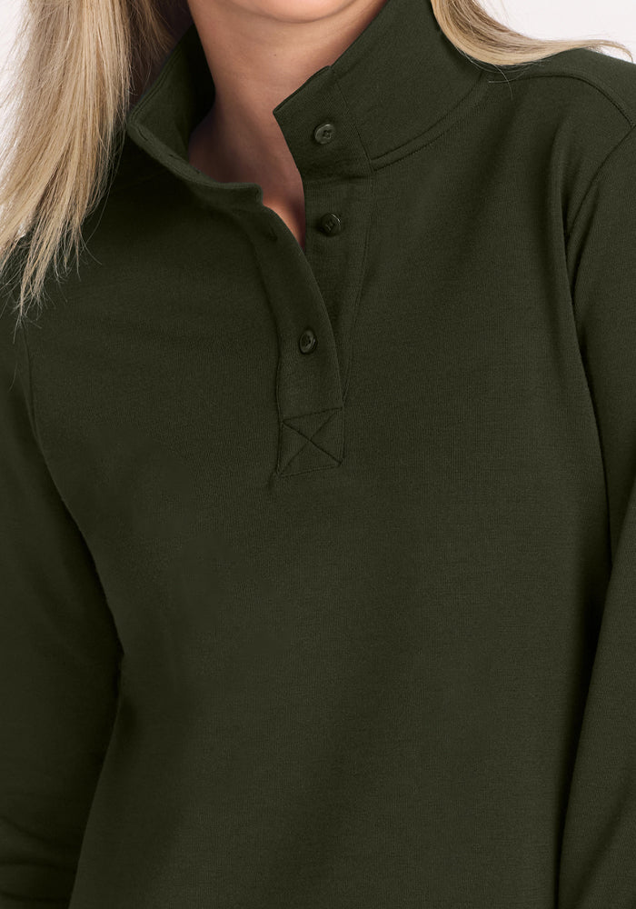 Model wears the Woolx Annie 3 Button Pullover in Duffel Bag; only her torso and part of her face are visible.