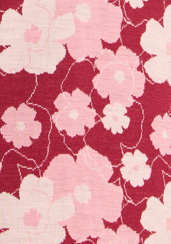Woolx Emi 1/4 Zip - Floral Crush: Red Merino base layer with pink & white flowers, odor-resistant.