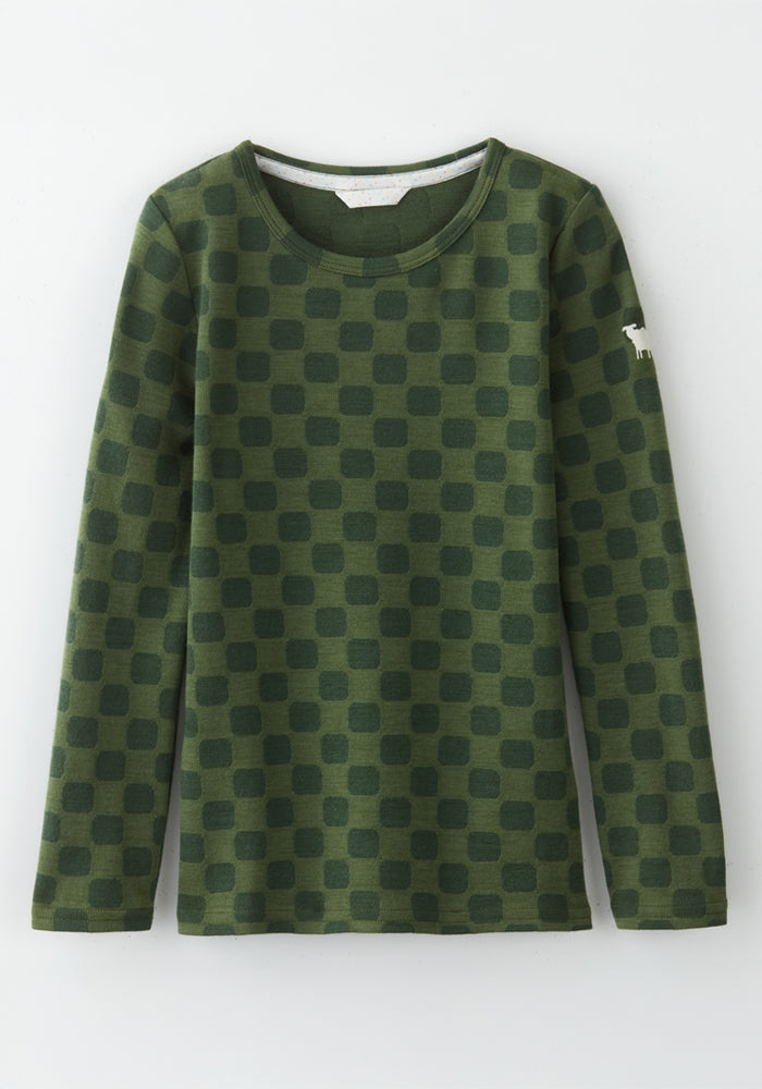 The Woolx Kids Explorer Base Layer Top - Frog Hop is a long-sleeved green Merino wool shirt featuring dark green squares, a white dog emblem on the upper left sleeve, and a soft, breathable feel—perfect as a kids’ wool thermal.