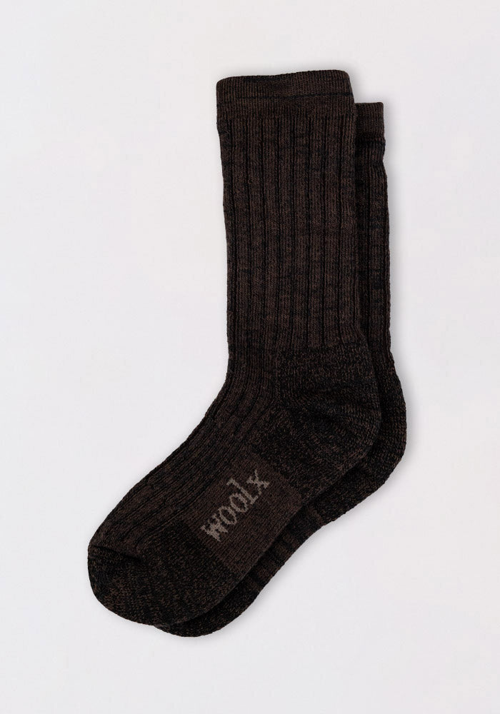 A pair of Woolx Mens Joey Crew Socks in Dark Espresso, featuring a ribbed design and "wool" on the foot, laid flat on a light background.