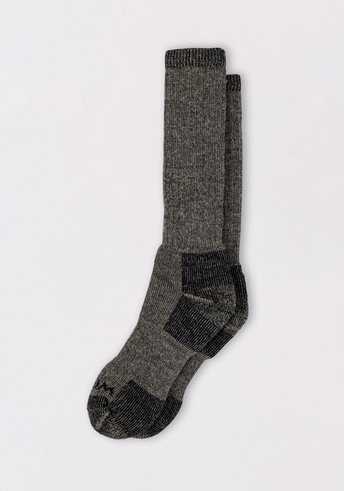 The Woolx Womens Extreme Over The Calf Socks in Charcoal Heather are heavyweight Merino wool socks with full cushioning and black accents on the toes, heels, and cuffs, shown laid flat on a plain white background.