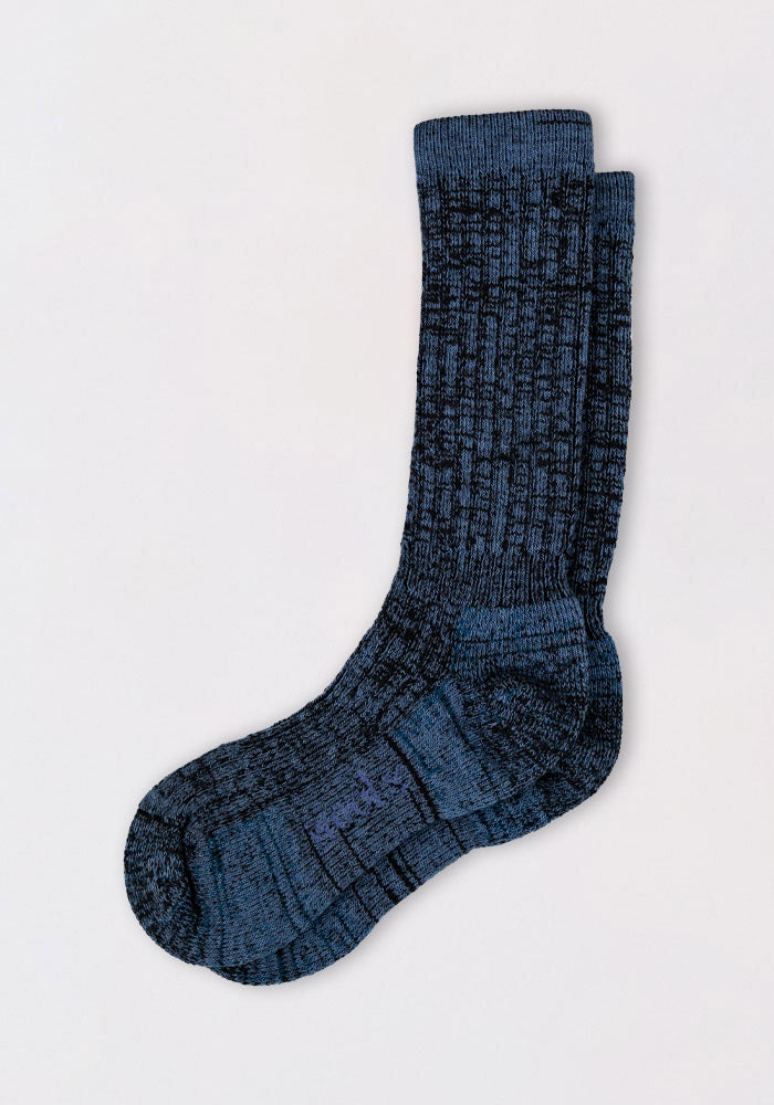 The Woolx Womens Joey Mid Calf Socks in Steel Blue, featuring a blue and black marled ribbed design, are laid flat and overlapping on a plain white background.