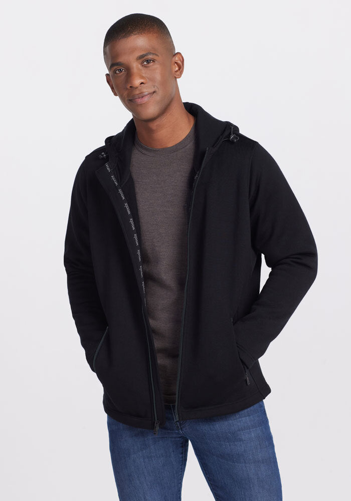 Model wearing Grizzly hoodie - Black | Trell is 6’2”, wearing a size M