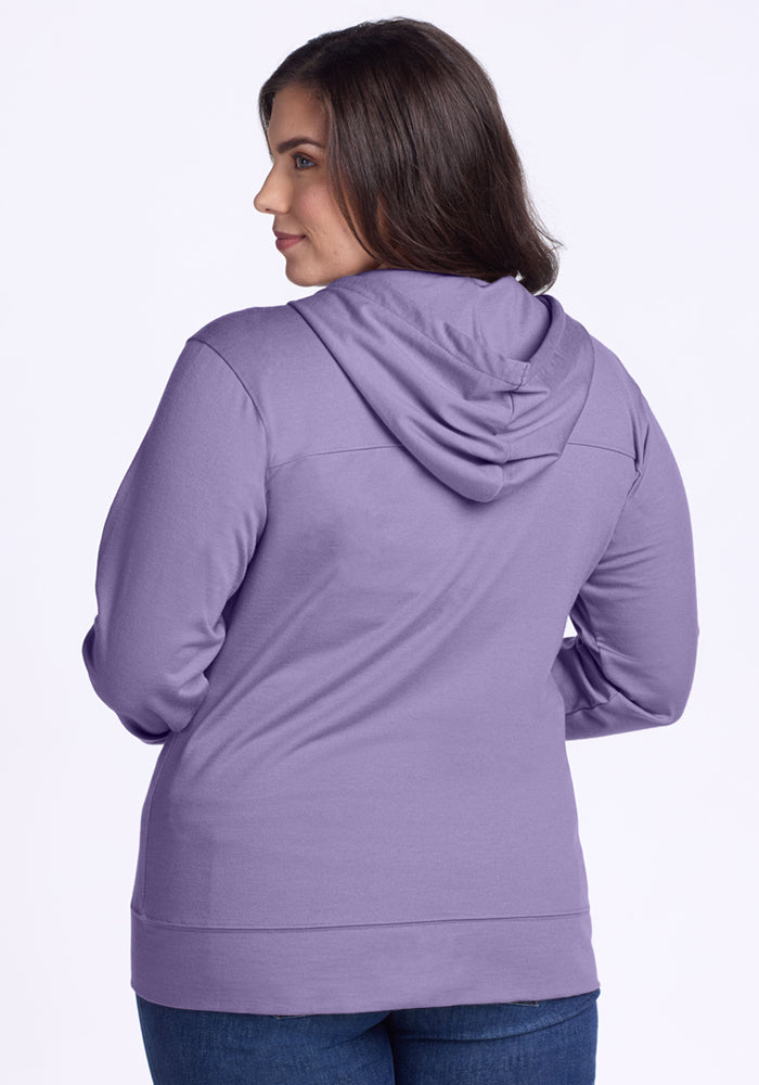 A woman with medium-length dark hair, seen from behind, wears a Woolx Ryann Hoodie in Montana Grape and blue jeans against a plain white background.