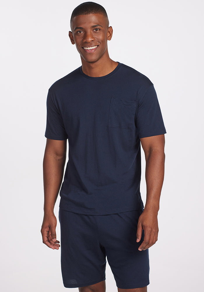 Model wearing Finn pajama top - navy | Trell is 6'2", wearing a size M