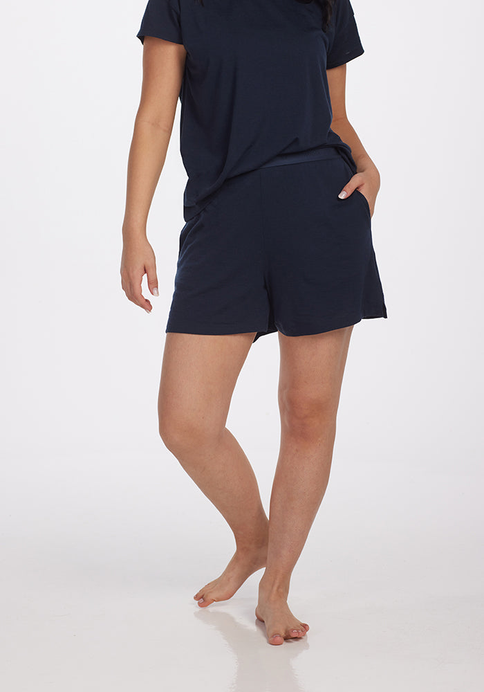 Model wearing Poppy shorts - Navy | Sarah is 5'8", wearing a size S