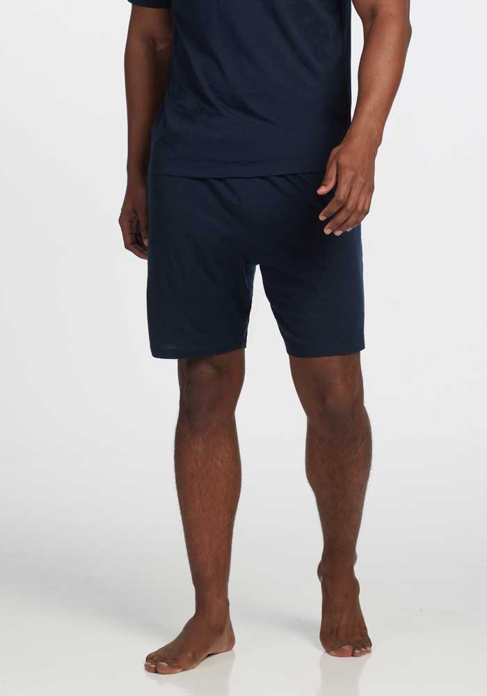 Model wearing Archer shorts - navy | Trell is 6'2", wearing a size M