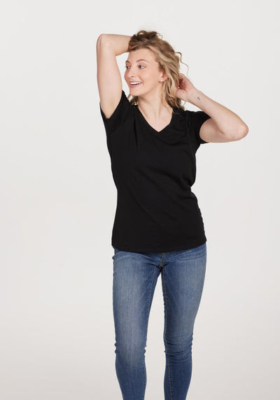 Women's merino wool t-shirt - Black | Jordan is 5' 6", wearing a size S