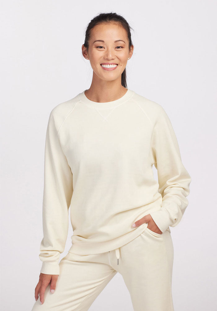 Woolx womens merino wool sweatshirt - Cream | Mary is 5'8", wearing a size S