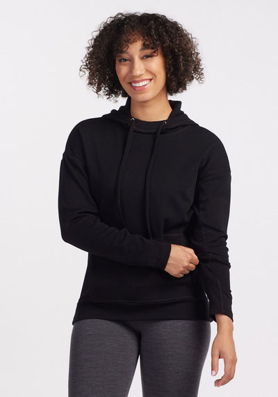 Womens merino wool hooded sweatshirt for women - Black | Tori is 5'7", wearing a size S