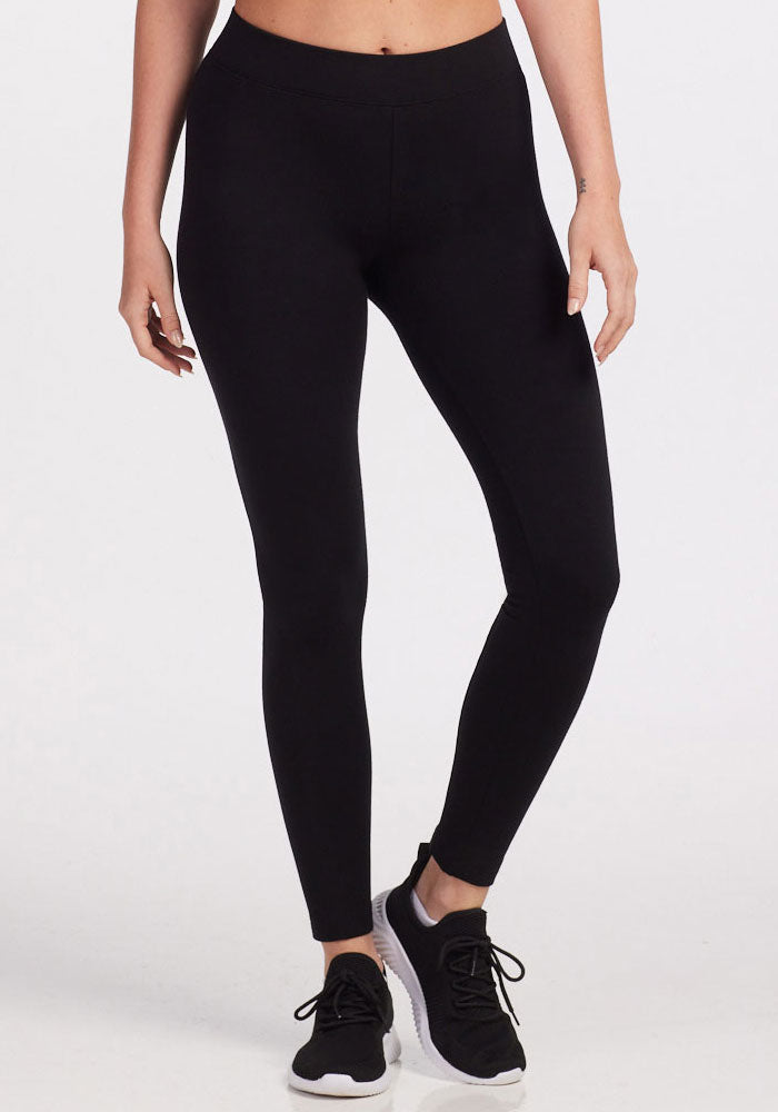 Womens warm base layer bottoms merino wool - Black | Karly is 5'10", wearing a size S