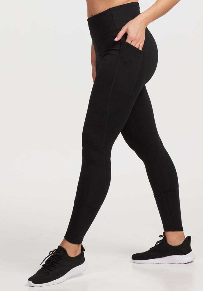 Womens merino wool pocket leggings - Black | Tori is 5'7", wearing a size S