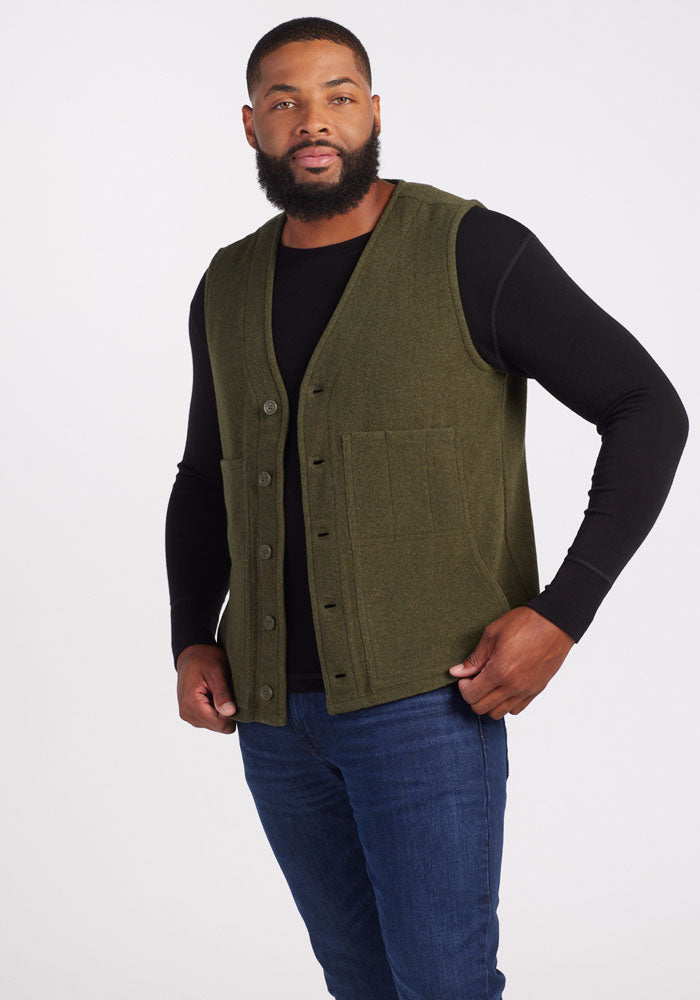 Mens merino wool button vest - Forest | Terrence is 6'3", wearing a size L